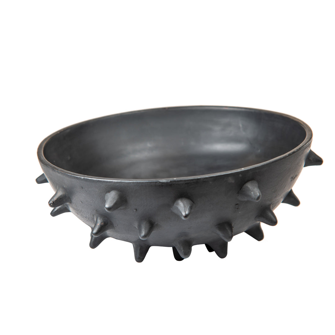 Close-up of Decorative Black Bowl – Unique ceramic bowl with spiked design in a matte black finish