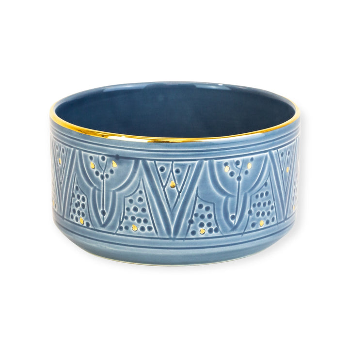 Handmade blue ceramic embossed bowl with gold trim
Blue ceramic bowl with intricate gold detailing
Decorative blue bowl for serving or display
Embossed ceramic bowl with gold accent