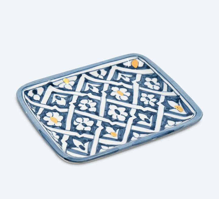 Small Fassia Blue Stone Gold Ceramic Tray on a website page with branding at the top.