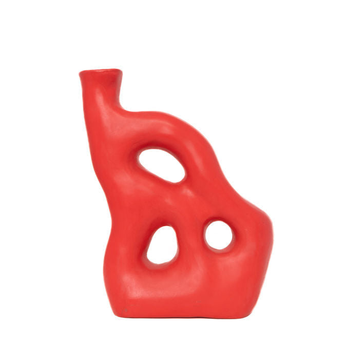 Abstract red sculptural vase handmade in ceramic, shown from an angled side view.