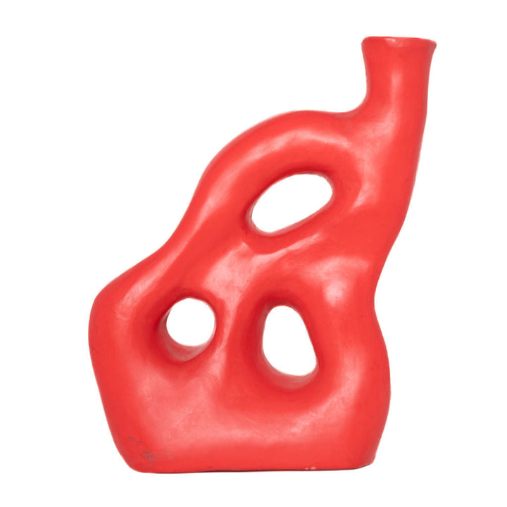 Vibrant red ceramic art vase with bold cutout design, ideal for shelf styling or dried flowers.