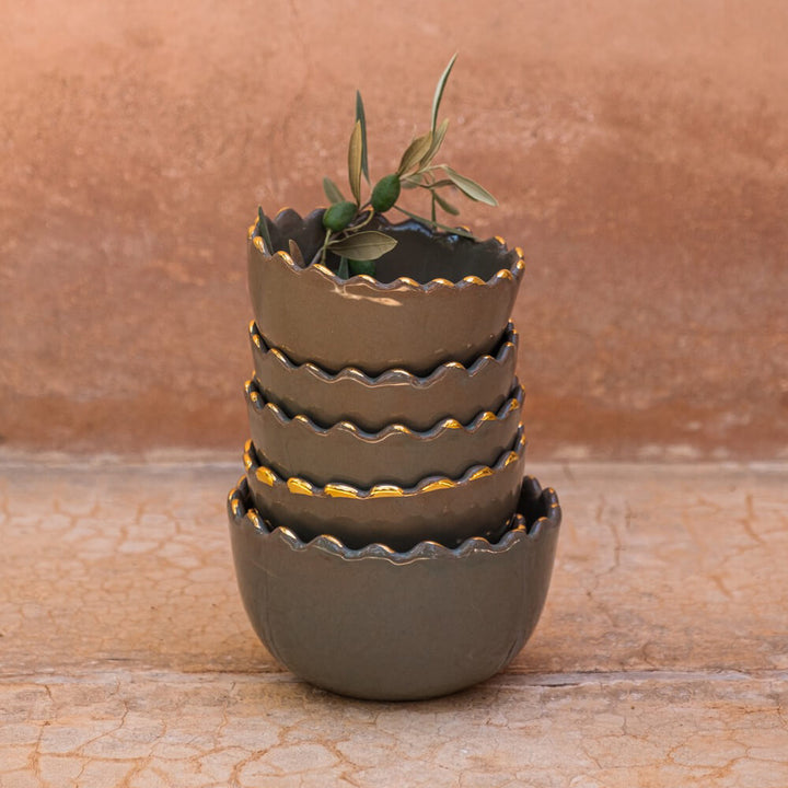 handcrafted green ceramic salad bowl with gold trim